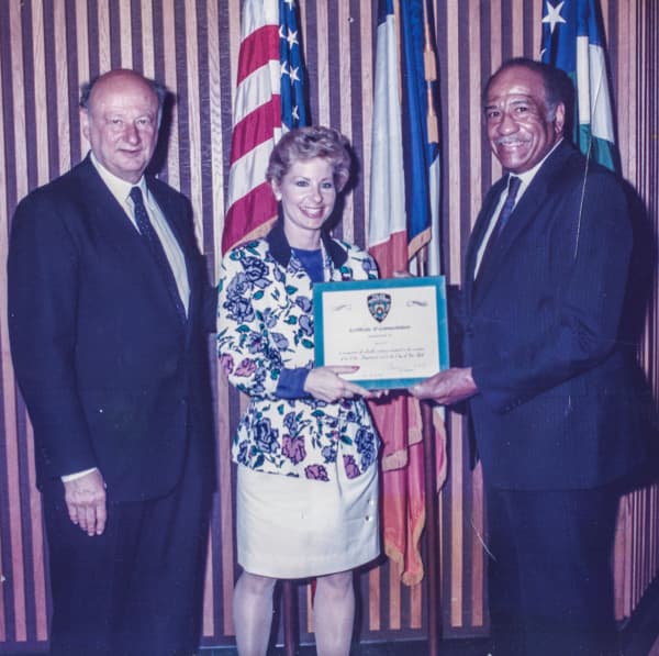 Sarah Wallace at City Hall with Mayor Ed Koch and Police Commissioner Benjamin Ward.